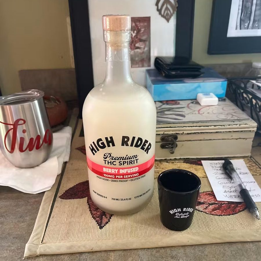High Rider Spirit bottle with black measuring cup on a table